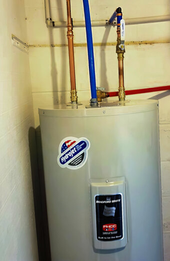 https://innaloohotwater.com.au/uploads/2025/06/electric-hot-water-system-32554.jpg
