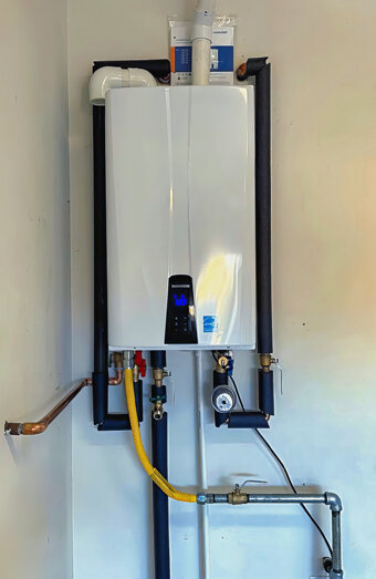 https://innaloohotwater.com.au/uploads/2025/06/instant-hot-water-systems-63860.jpg